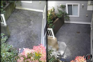 stamped concrete back patio and stairs with dirty retaining wall power washed